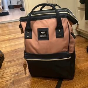 Gorgeous and spacious backpack. Brand new, never used.
